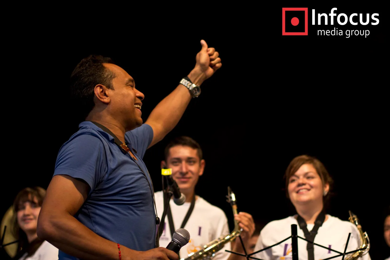 Jay Rodriguez Sierra cheering on young saxophonists during a music workshop in Guadalajara, Mexico.