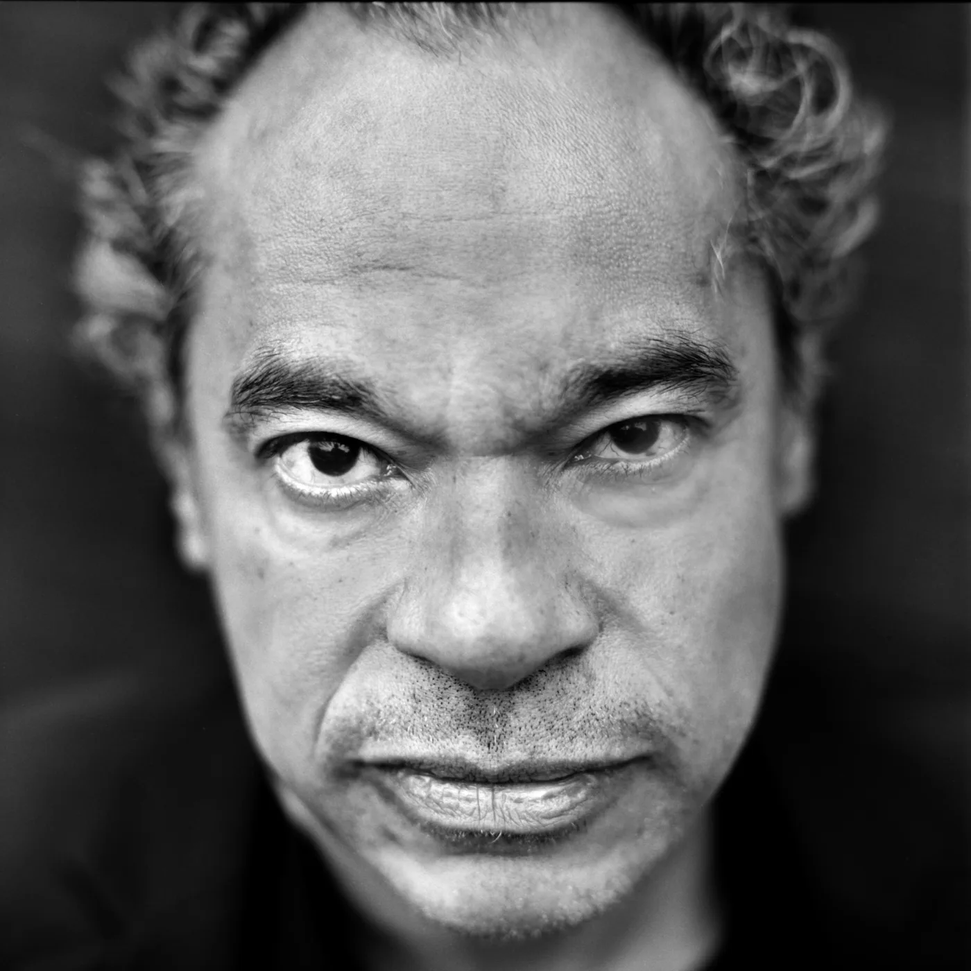 Black-and-white portrait of Jay Rodriguez Sierra.